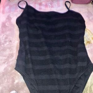 One piece black bathing suit